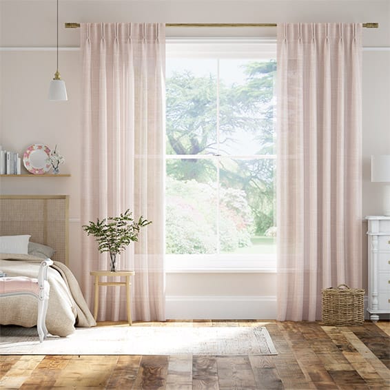 Sheer pink classic curtains with a double pinch pleat heading. 