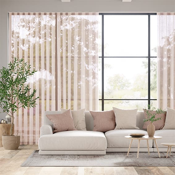Sheer pink s-fold curtains in a modern living room. 