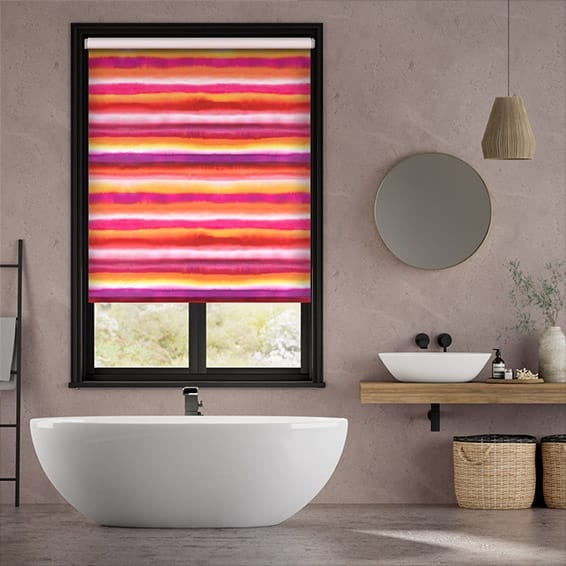 This bathroom gets a splash of Barbiecore with this watercolour stripe roller blind.