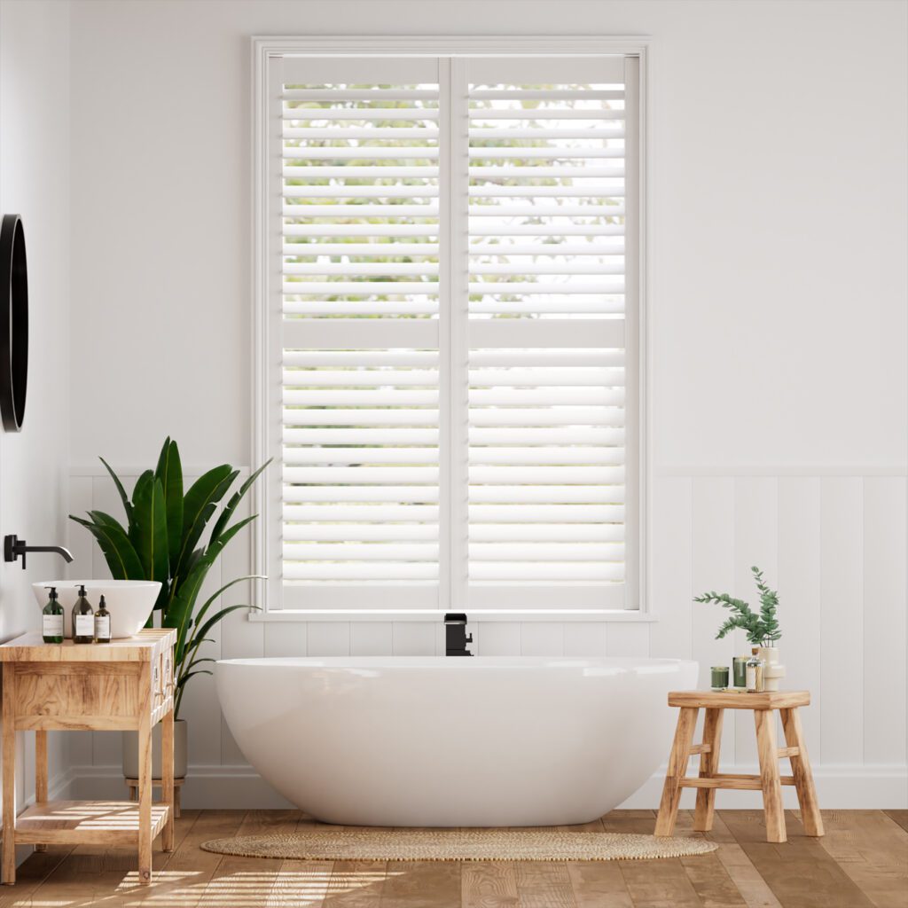 Image shows a bathroom interior with the Easi-Fit Express planation shutters covering the window
