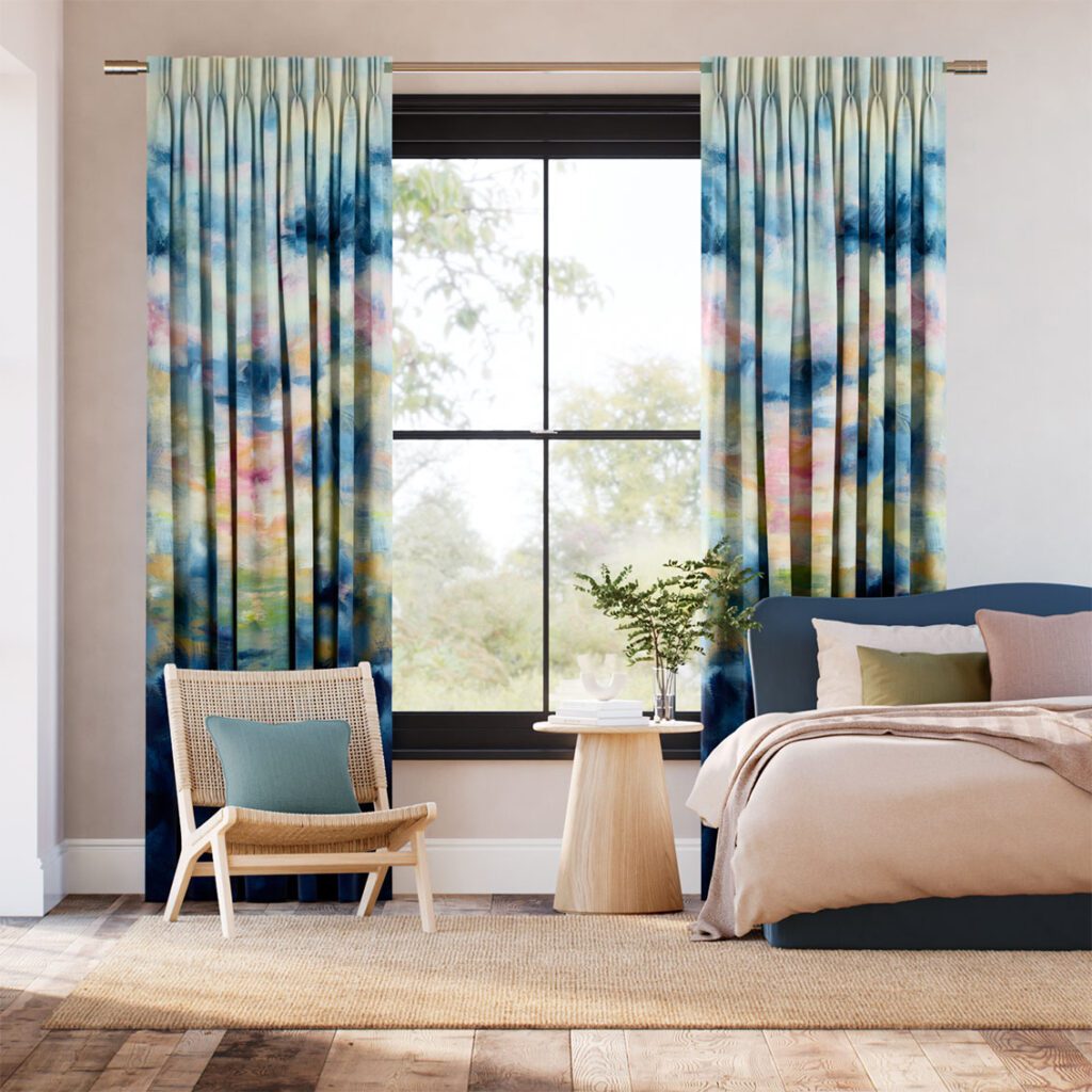 Watercolour fabric curtains with a double pinch pleat heading. Can now be motorised with SmartView